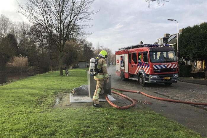 Zak met as zorgt voor containerbrand