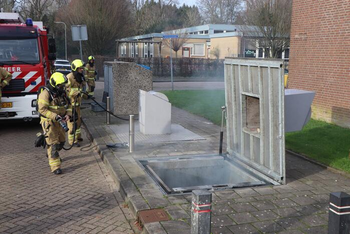Brand in ondergrondse container