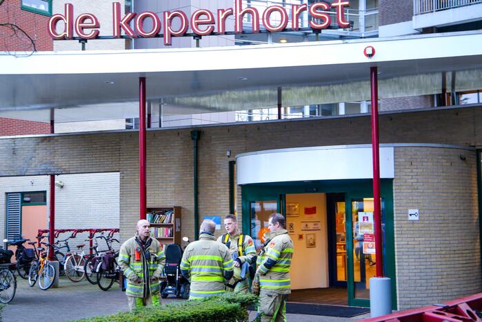 Brand in liftmachinekamer op elfde etage de Koperhorst