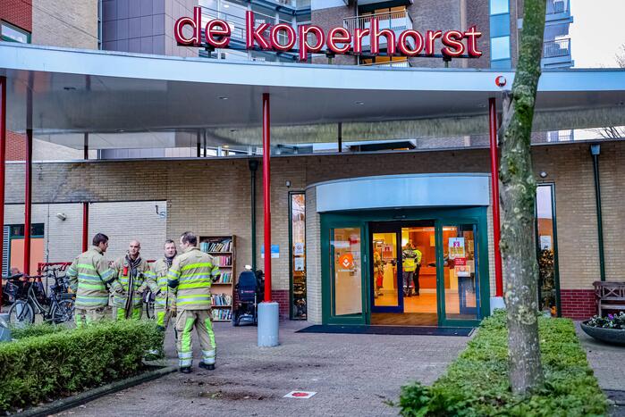 Brand in liftmachinekamer op elfde etage de Koperhorst