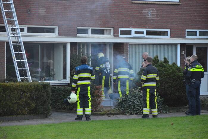 Woning vol rook door schoorsteenbrand