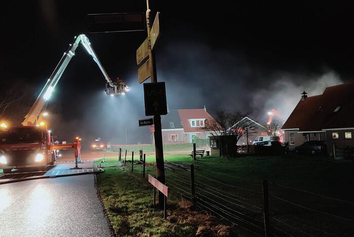 Veel rook bij uitslaande brand in loods