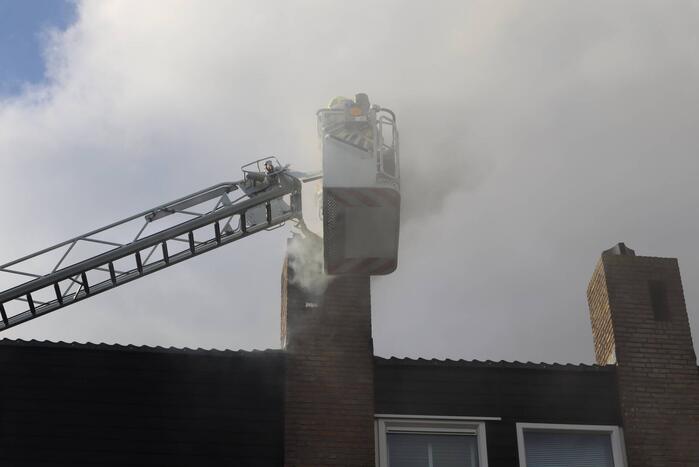Veel rook bij brand in schoorsteen