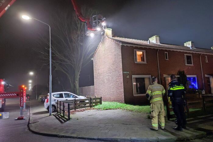 Brand in schoorsteen van woning
