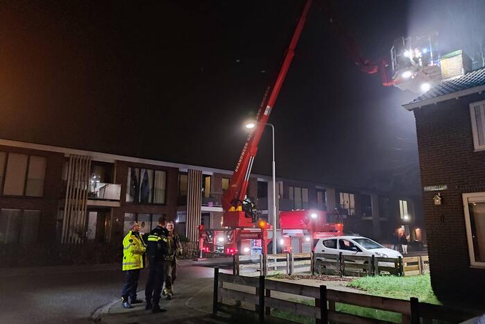 Brand in schoorsteen van woning