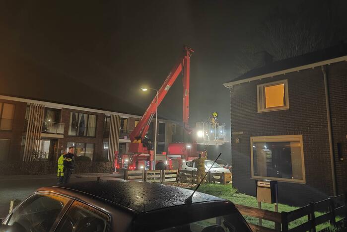 Brand in schoorsteen van woning