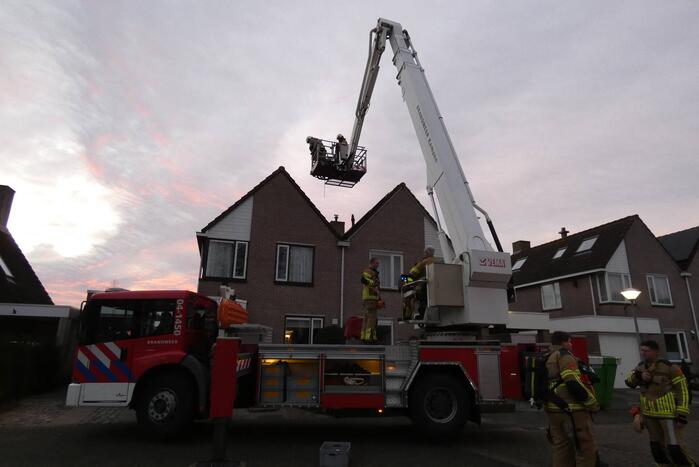 Brand in schoorsteen van woning