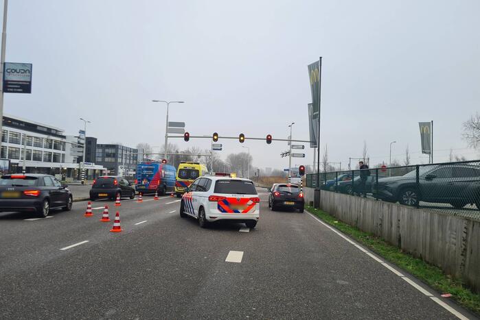 Schade bij kop-staartbotsing voor stoplicht