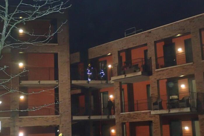 Brandweer blust brand in appartement