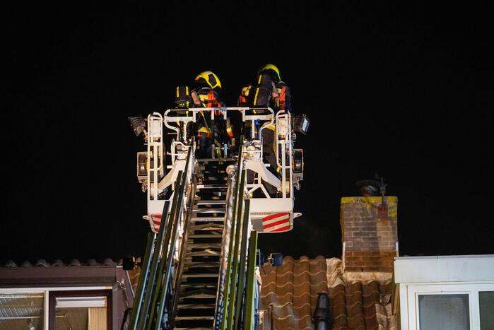 Schoorsteen geveegd na brand