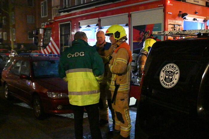 Man gewond bij woningbrand, parkiet overleden