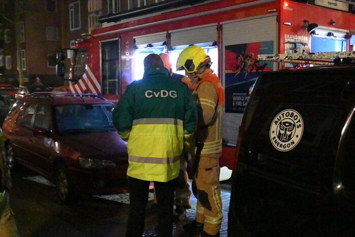 Man gewond bij woningbrand, parkiet overleden