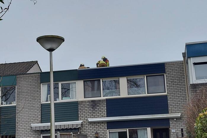 Brandweer controleert schoorsteen na brand
