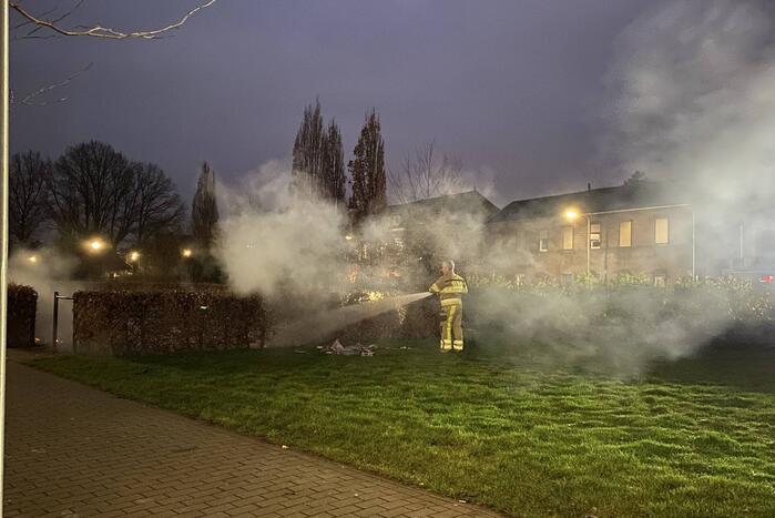Handhaving blust brand in hoop afval