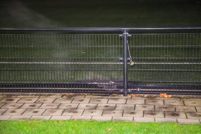 Schade na brand in container bij voetbalvereniging