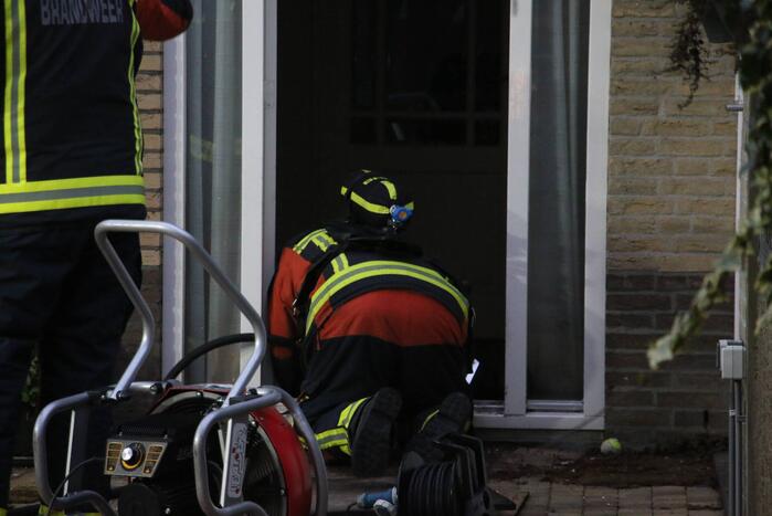 Lastige brand in kruipruimte van woning