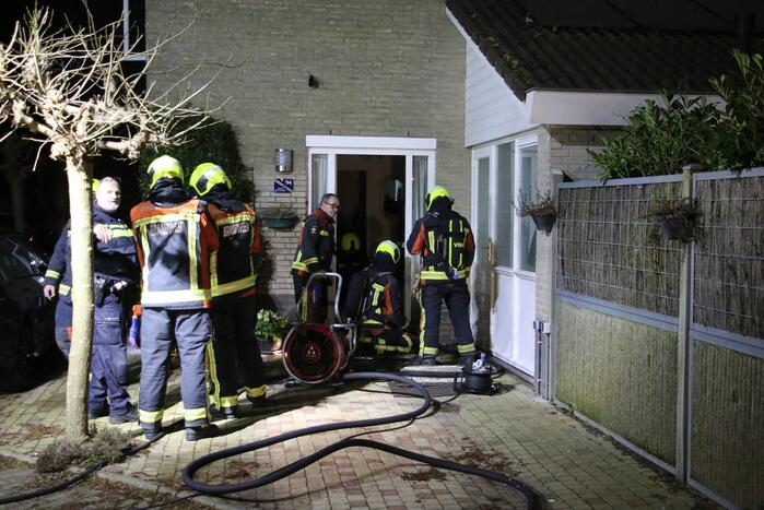 Lastige brand in kruipruimte van woning