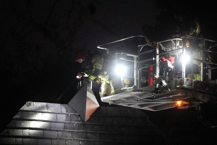 Schoorsteen geveegd na brand