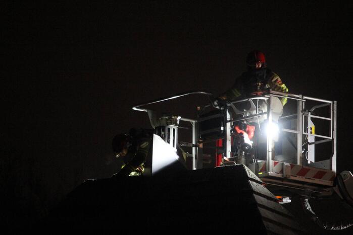 Schoorsteen geveegd na brand