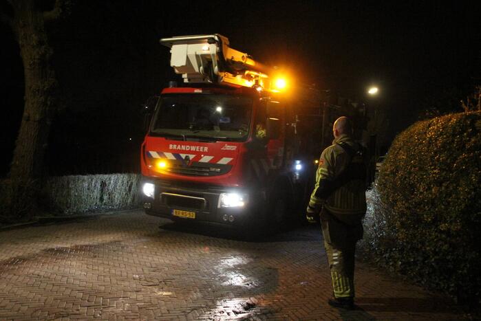 Brand in schoorsteen van woning