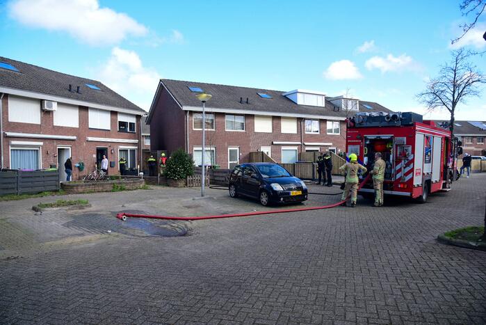 Brand in achtertuin van woning