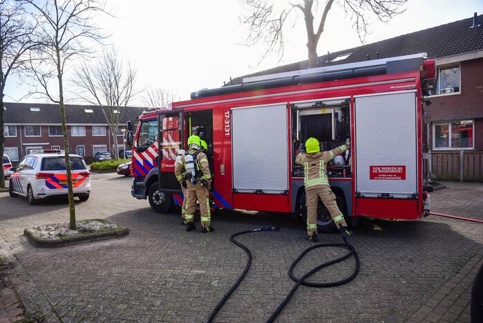 Brand in achtertuin van woning