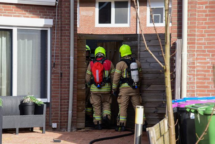 Brand in achtertuin van woning