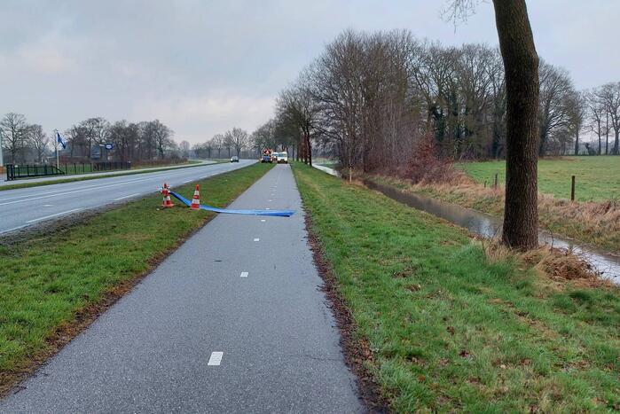 Weiland onder water door geknapte transportwaterleiding