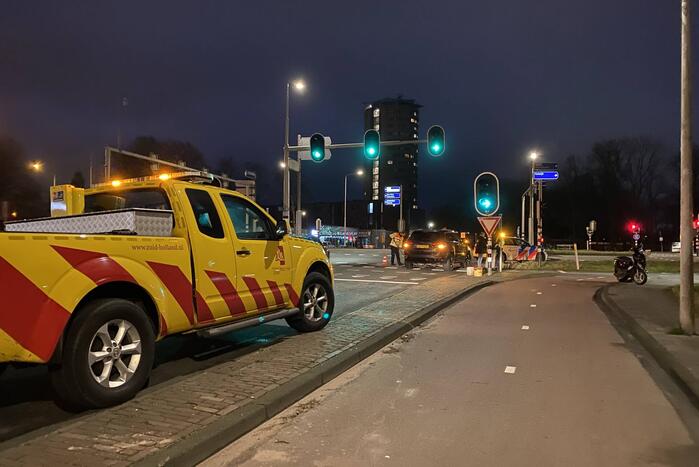 Scooter flink beschadigd na botsing met Jeep