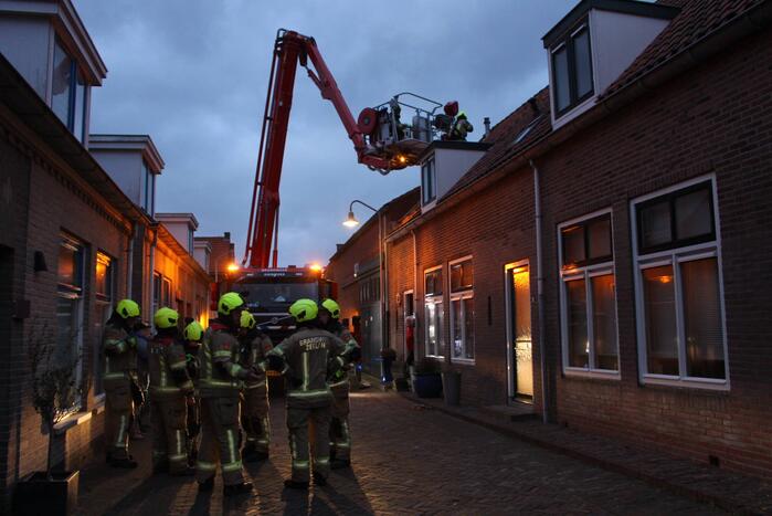 Dakbedekking van kerktoren laat los