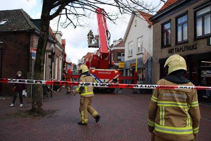 Losliggende dakpannen vastgezet