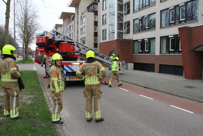 Dakbedekking flatgebouw los gewaaid