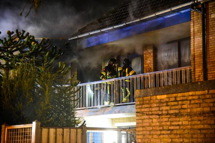 Forse brand in slaapkamer van woning