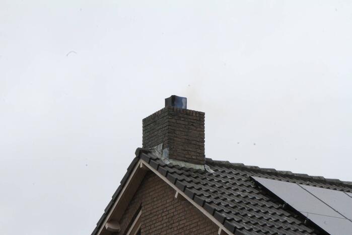 Brand in schoorsteen van woning