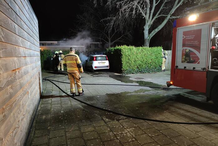 Rookontwikkeling vanwege brand in personenauto
