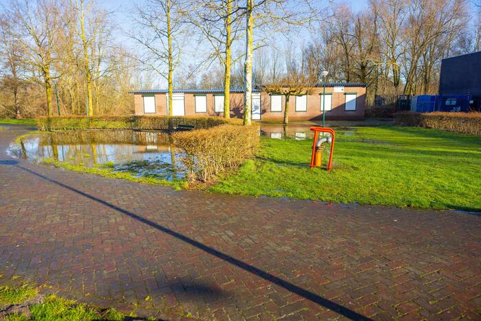 Velden Sportcomplex Buiningpark onder water door lekkende brandkraan
