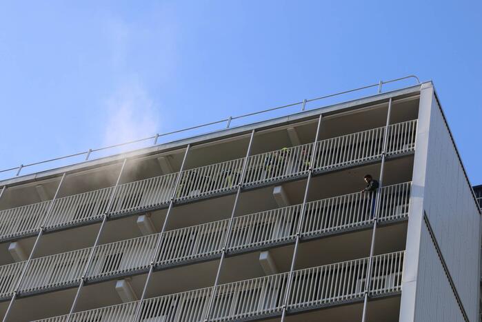 Brand op 12e verdieping van Eisenhouwerflat