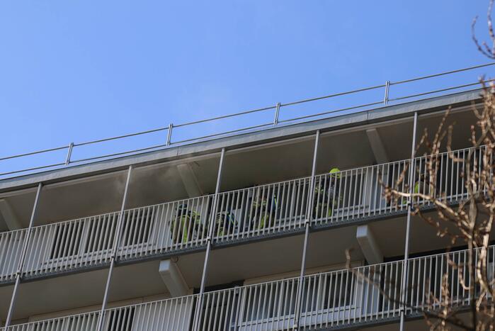 Brand op 12e verdieping van Eisenhouwerflat