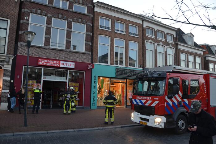 Brandweer controleert winkel na brandmelding