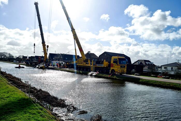 Berging van mobiele telescoopkraan in volle gang