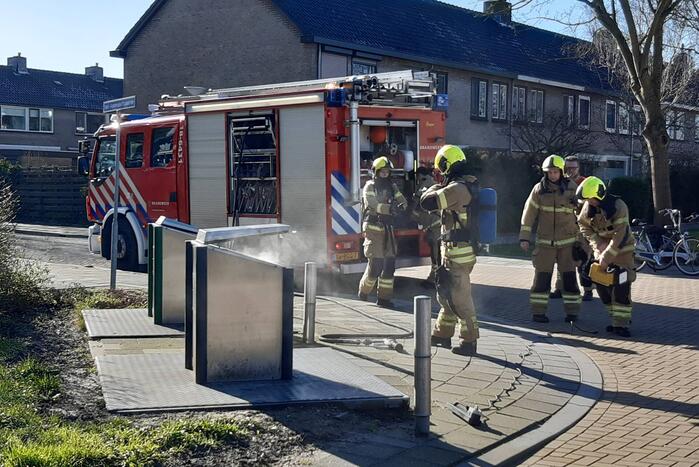 Veel rook bij brand in ondergrondse container
