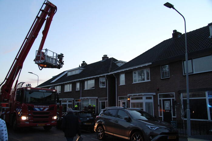 Brand in schoorsteen van woning