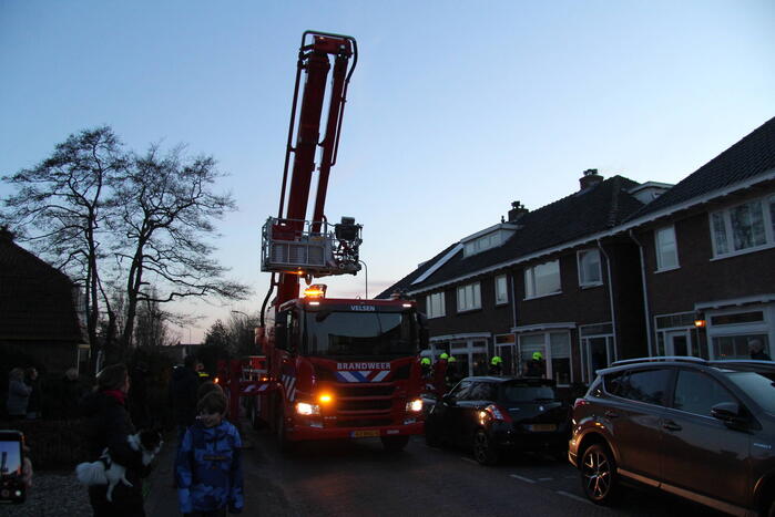 Brand in schoorsteen van woning