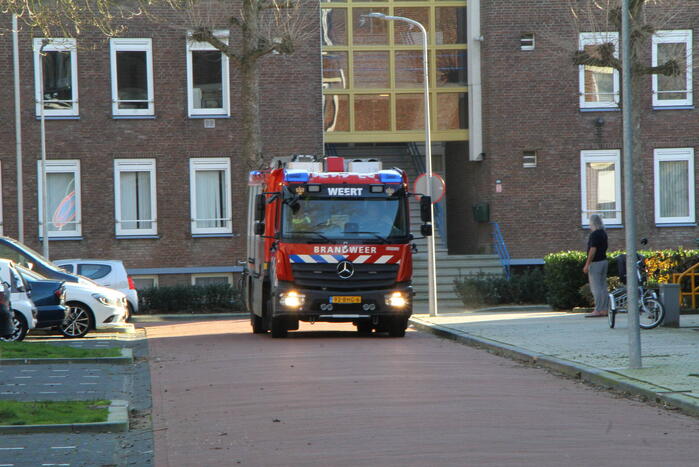 Omwonenden zien rook in portiekwoning