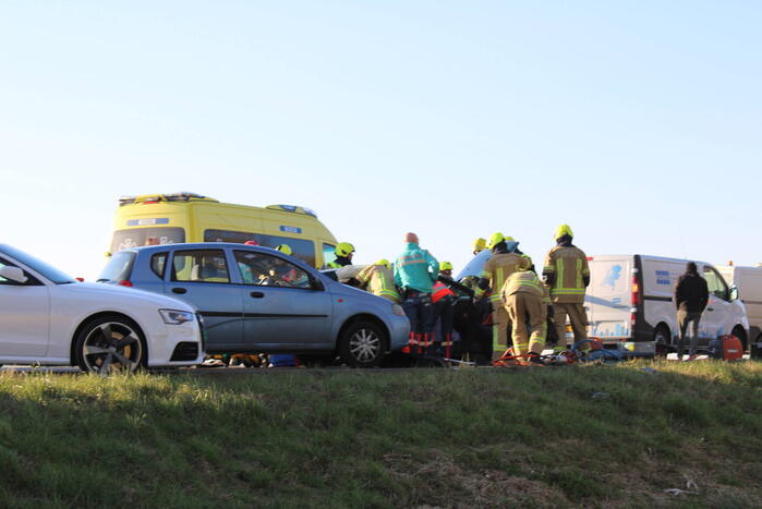 Inzittende bekneld na kettingbotsing