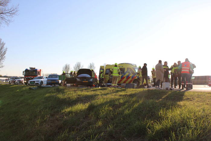 Inzittende bekneld na kettingbotsing