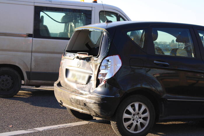 Inzittende bekneld na kettingbotsing