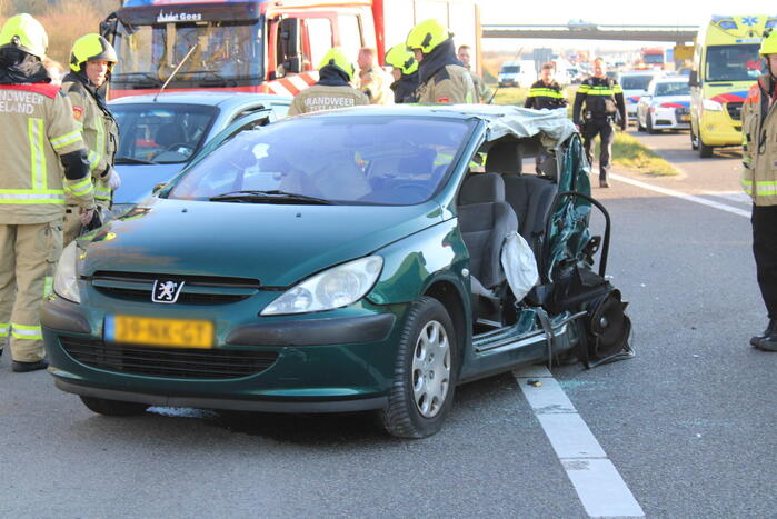Inzittende bekneld na kettingbotsing