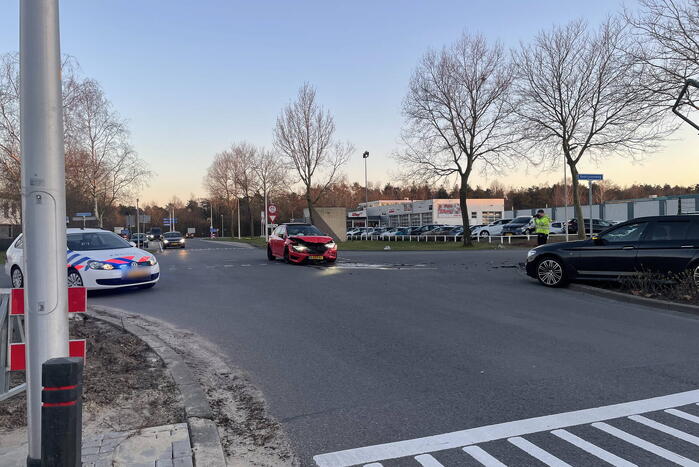Schade na botsing op kruising