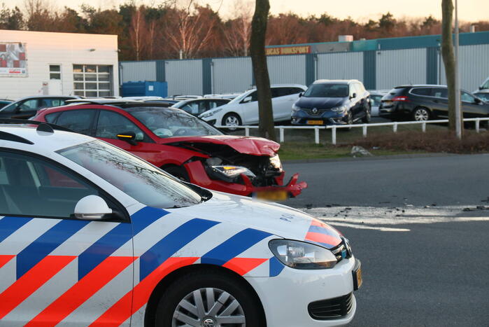 Schade na botsing op kruising